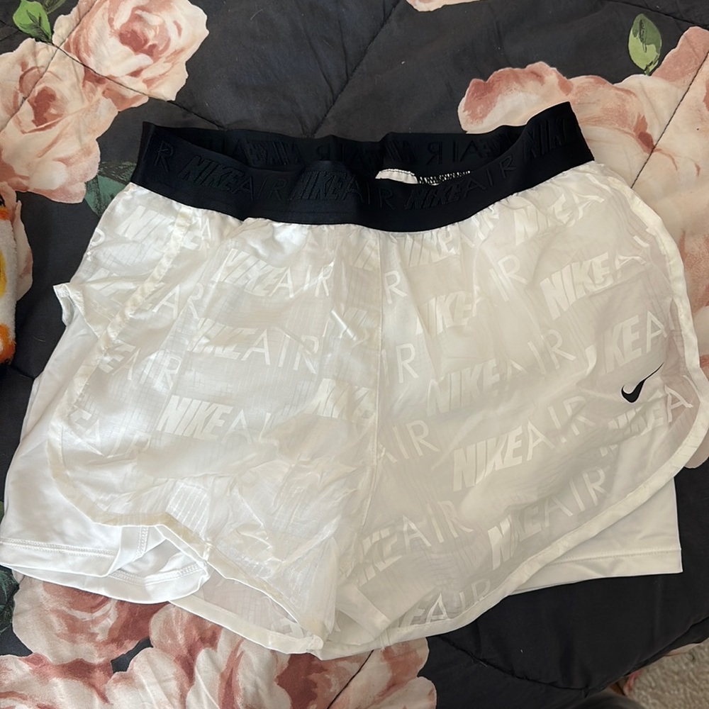 White Nike shorts